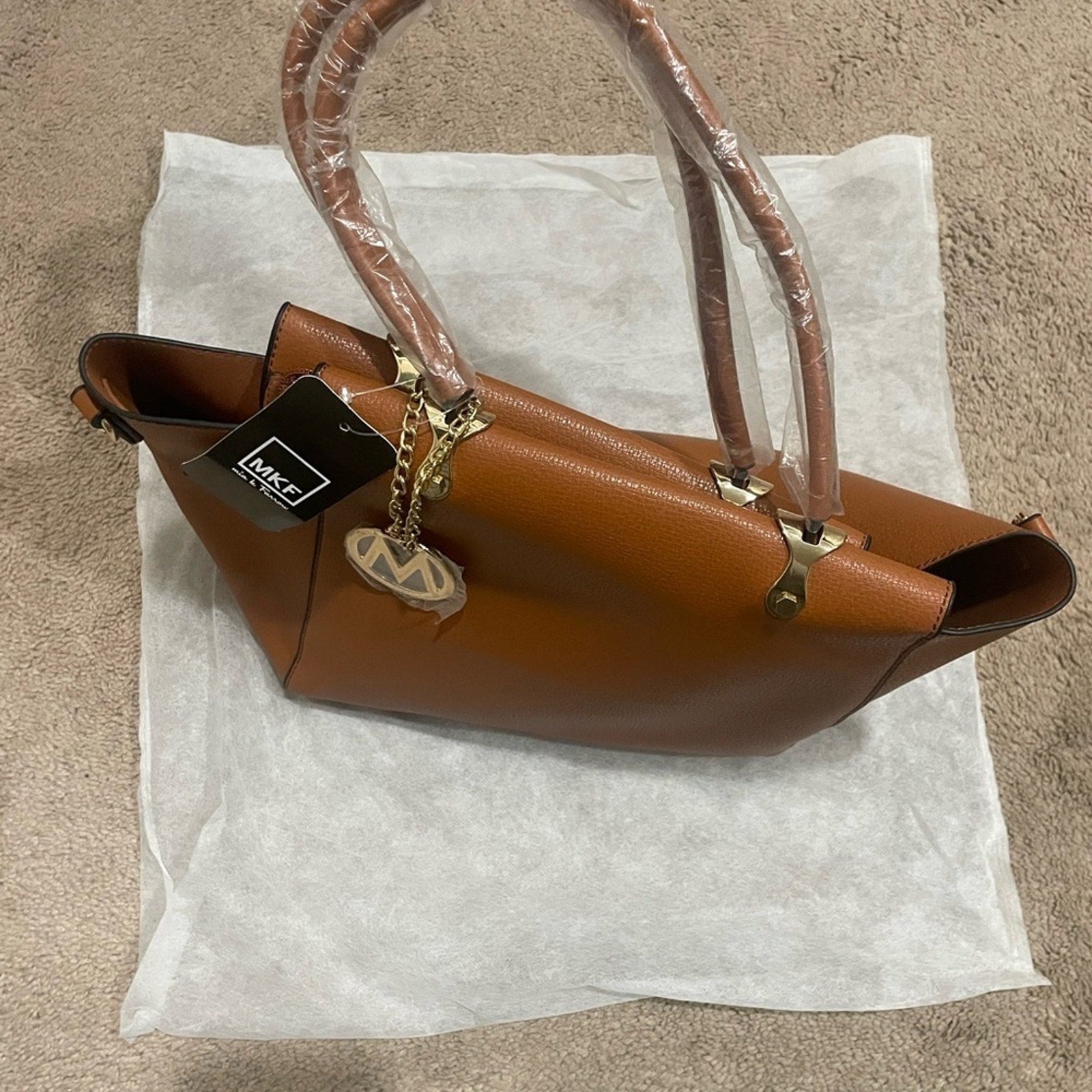 Mia K Farrow shoulder bag with gold collection piece