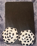 White earrings with black overlay