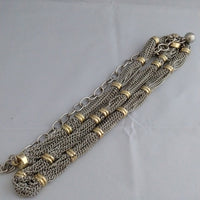 Silver tone chain with goldtone accents