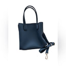 A stylish Sky Blue handbag Unknown brand with a snap gold closure NWOT