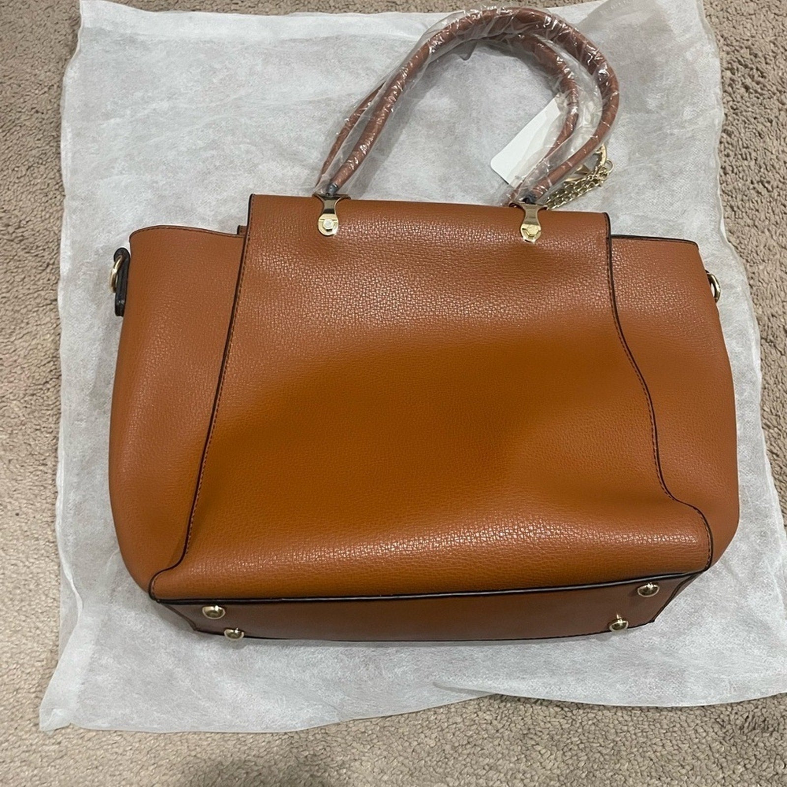 Mia K Farrow shoulder bag with gold collection piece