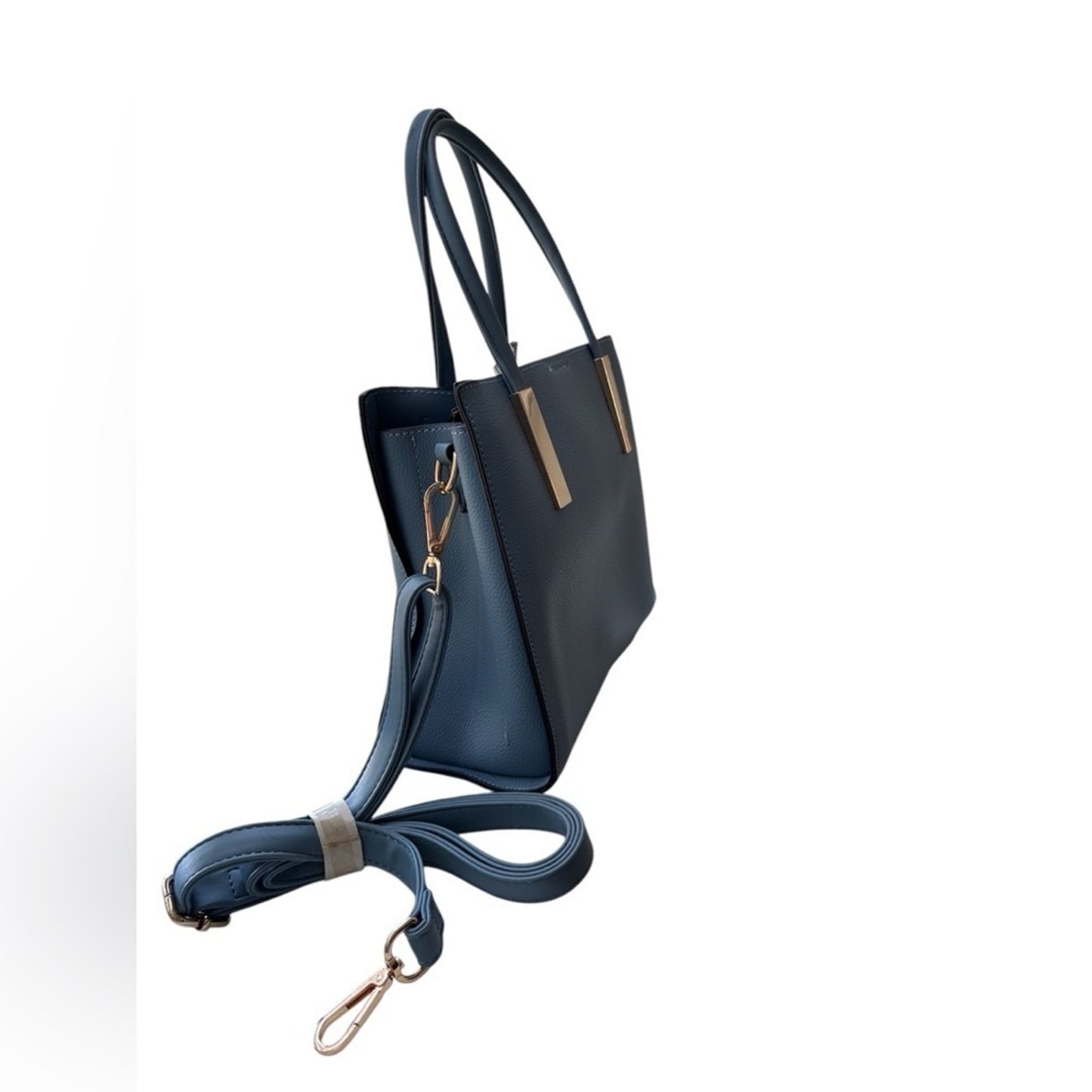 A stylish Sky Blue handbag Unknown brand with a snap gold closure NWOT