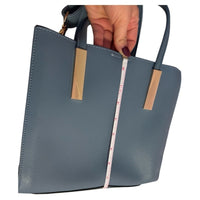 A stylish Sky Blue handbag Unknown brand with a snap gold closure NWOT