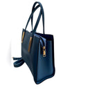 A stylish Sky Blue handbag Unknown brand with a snap gold closure NWOT